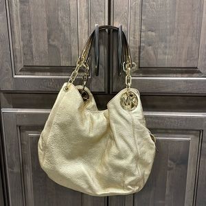 Michael Kors hobo gold handbag